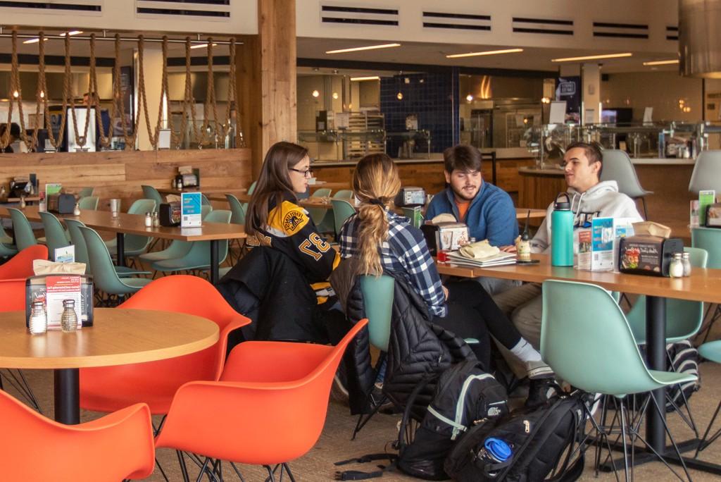 students eat in the dining area on the third floor of the Ripich Commons